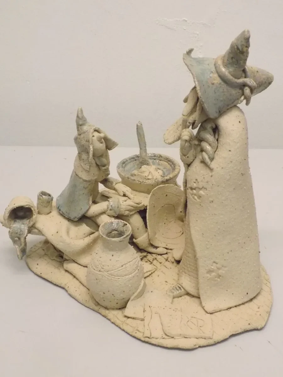 Original Stoneware sculpture of a sorcerer and his apprentice by renowned artist Stewart Taylor